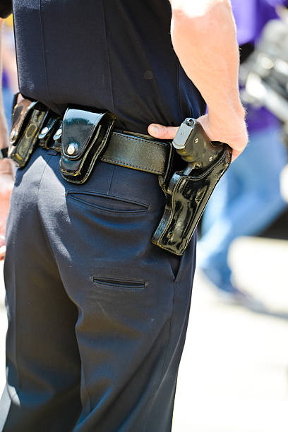 istock Policeman standing on the street 474895589