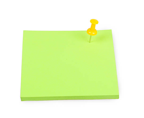istock Blank green sticky note with yellow push pin 474895959