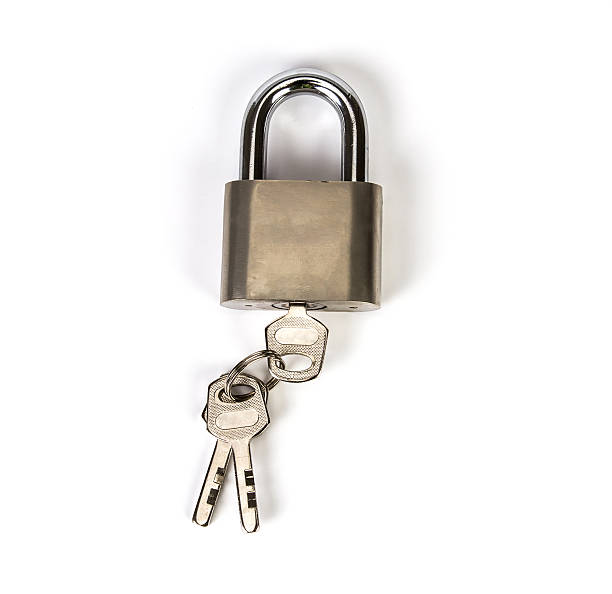 istock Mealic padlock with the key on white background 474896036