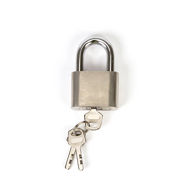 istock Mealic padlock with the key on white background 474898662