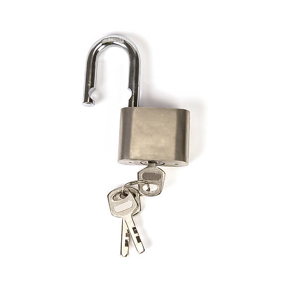 istock Mealic padlock with the key on white background 474898666