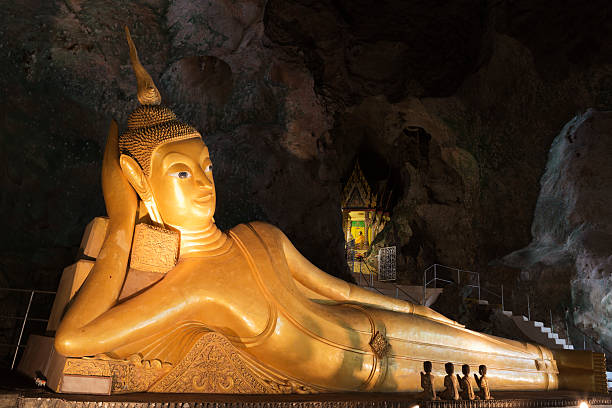 istock Golden Buddha Statue of Ancient Wat Suwan Kuha Temple 474899549