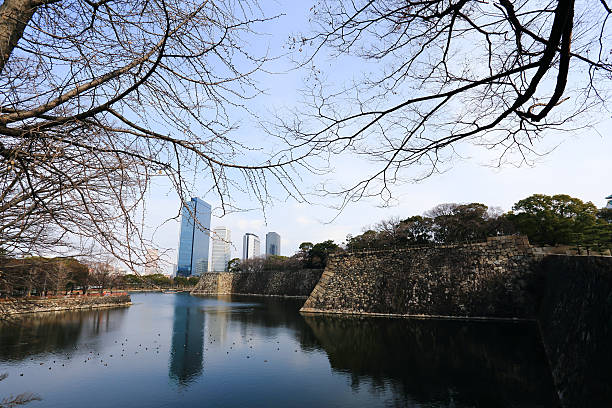 istock moat surrounding Osaka castle in Japan, winter 474899699
