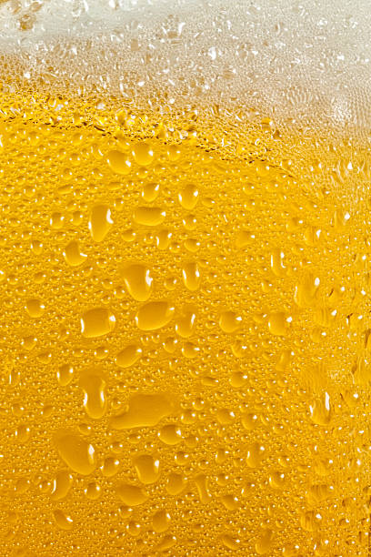 istock Bubbles and foam in a beer 474900091