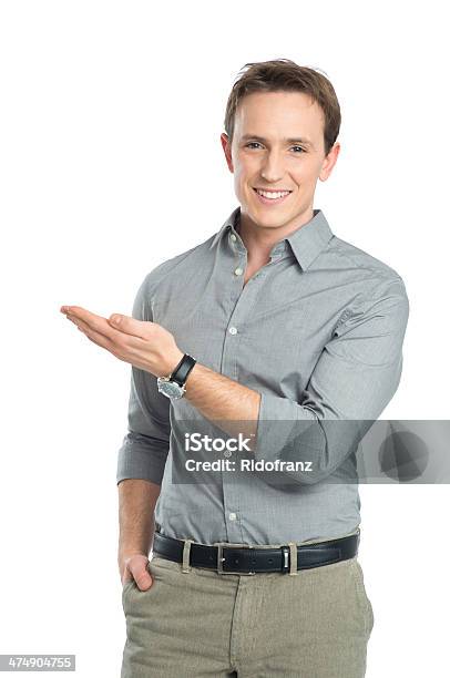 Portrait Of Businessman Presenting Stock Photo - Download Image Now - Businessman, Men, Explaining