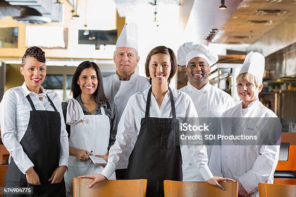 Diverse Staff Of Chefs And Waiters In Modern Restaurant Kitchen Stock Photo - Download Image Now