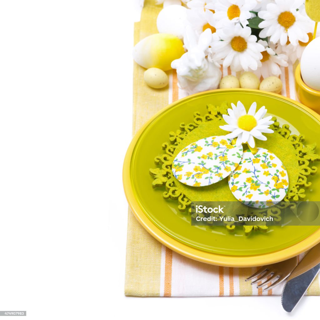 Festive Easter table setting with decorations, flowers Festive Easter table setting with decorations, flowers and rabbit, top view, isolated on white Arranging Stock Photo