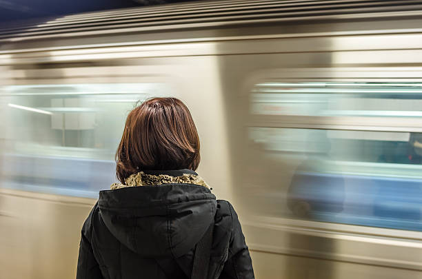 istock Woman Waiting at a Subway Station 474908400