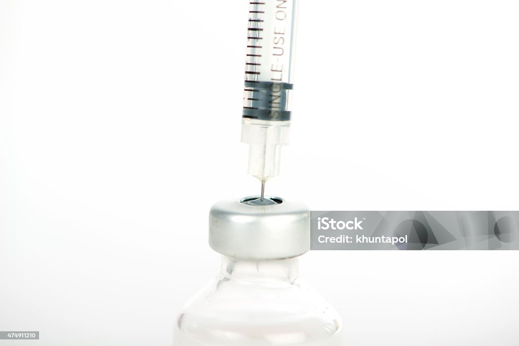 Closed up filling injection syringe from medical ampule 2015 Stock Photo