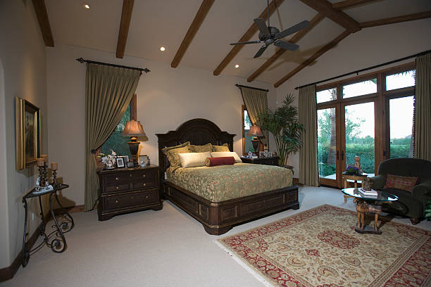 istock Bedroom With Beamed Ceiling And Patio Doors 474914279