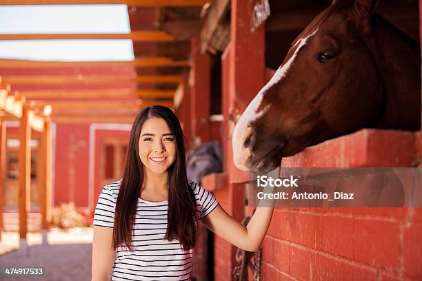Cute Latin Woman And Her Horse Stock Photo - Download Image Now - 20-29 Years, Adult, Animal