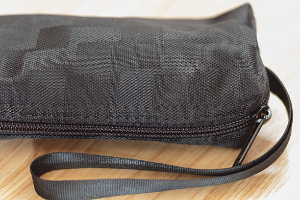 istock Closed up black bag on  wooden table 474921092