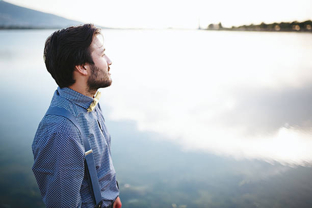 istock Portrait of modern young man looking away 474921518