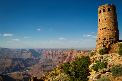 Desert View Watchtower overlooking The Grand Canyon in Grand Canyon National Park, Arizona, USA. It is considered one of the Seven Natural Wonders of the World and stretches 277 miles long.