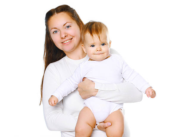 istock Happy mother holding cute baby 474926664