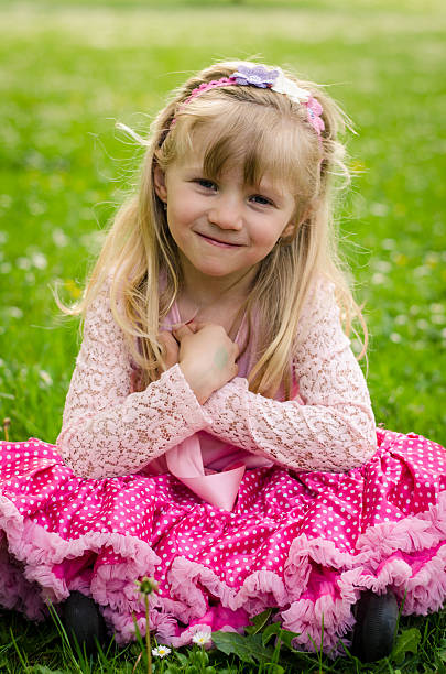 istock blond girl in meadow 474930532