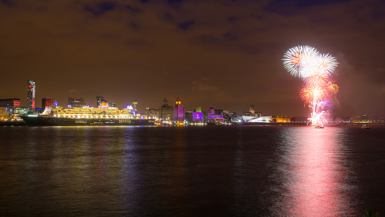 Liverpool, United Kingdom - May 24, 2015: Queen Mary 2, Cunard's flagship ocean liner, celebrates the company's 175 anniversary on May 24, 2015.