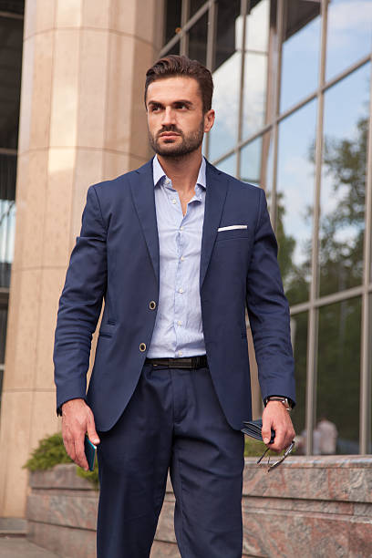 istock Business Man Commuting To Work, Cityscape On The Background 474932142