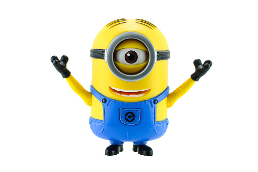 Adelaide, Australia - May 05, 2014: Minion figurine from the movie Despicable Me. This figurine was distributed with Mcdonalds Childrens Happy meals within australia to promote the movie.