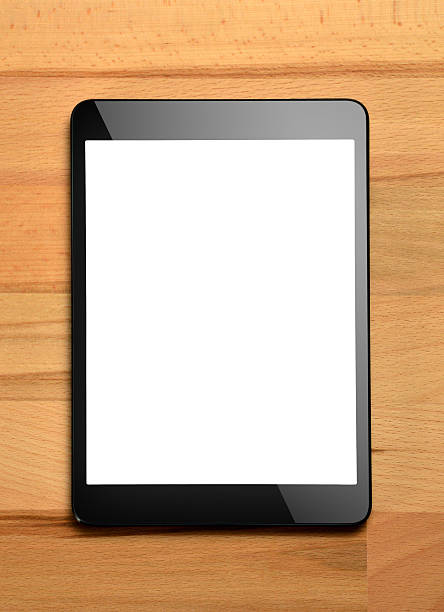 istock Digital tablet on the wood background (Screen with Clipping Path) 474936857