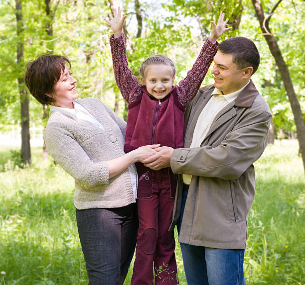 istock Family in the park 474937186