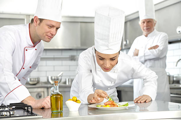 istock Chefs preparing the delicious salmon dishes 474938548