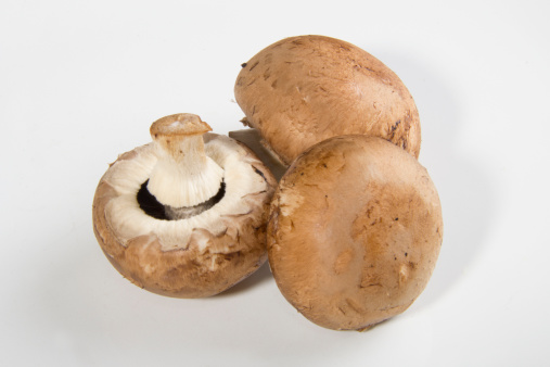 Studio shot of whole Chestnut Mushrooms