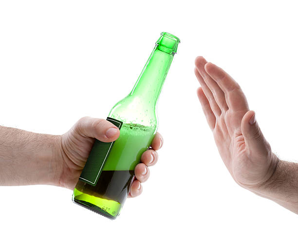 istock hand reject a bottle of beer 474941813