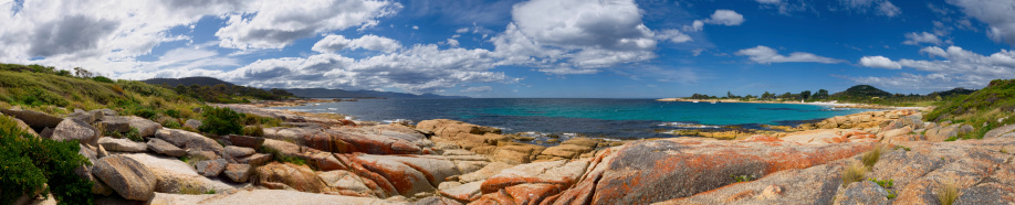 bicheno beach in tasmania australia with beautiful blue water