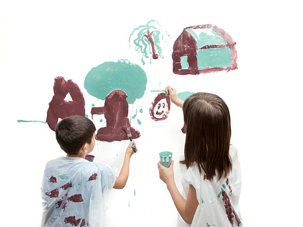 istock Siblings painting a picture. 474944772