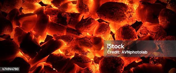 Glowing Charcoal Briquettes Background Texture Stock Photo - Download Image Now - 2015, Abstract, Ash