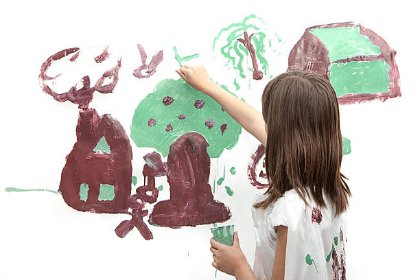 istock Girl paints a picture. 474944790