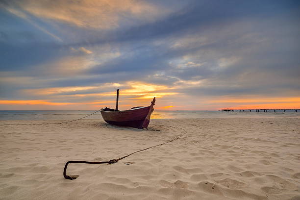 istock Fishing boat on the Baltic beach, Germany 474944844