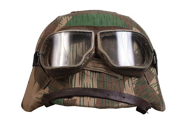 istock camouflaged nazi german helmet with protective goggles 474945234