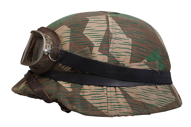 istock camouflaged nazi german helmet with protective goggles 474945242