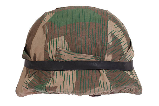istock camouflaged nazi german helmet with protective goggles 474945286