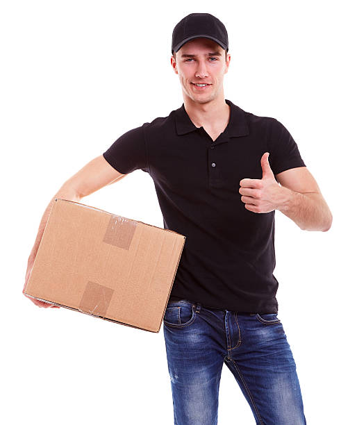 Delivery man holding a cardboard box