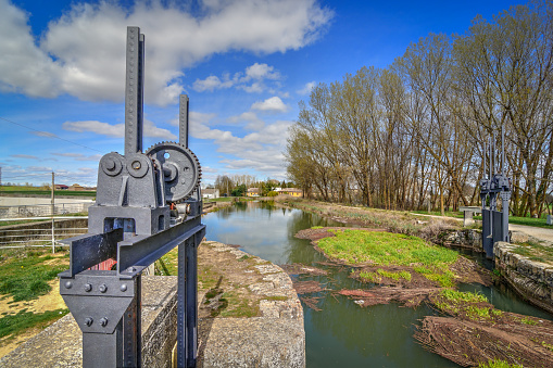 Canal de Castilla, a former transportation structure from the 18/19th century, using now for leisure and for irrigation purposes. It's over 200km long.