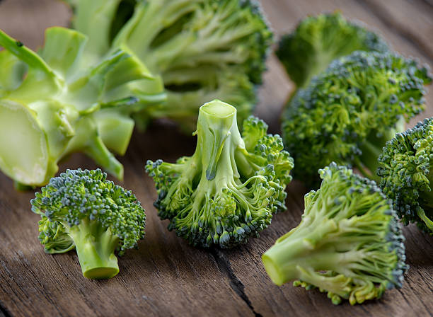 istock Broccoli on old wooden 474947380
