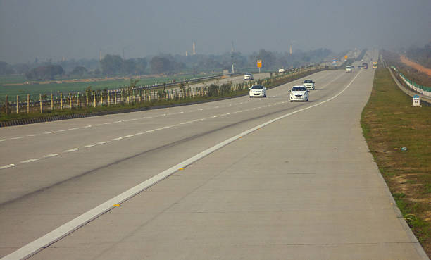 Expressway World class Yamuna expressway connecting Delhi-Agra in India multiple lane highway stock pictures, royalty-free photos & images