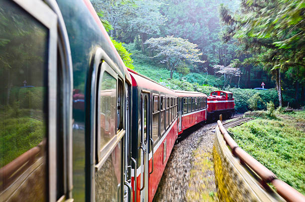 istock Forest railway with train move blurred in Alishan National Sceni 474948225