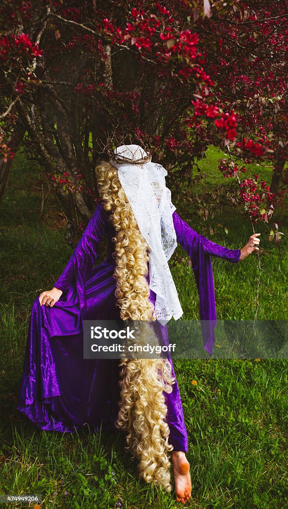 Woman Dressed As The Fairy Tale Character Rapunzel Stock Photo - Download  Image Now - iStock
