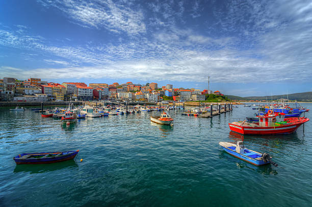 Finisterre Finisterre in Galicia, Spain, as seen from the harbour, with the marina and the fishing boats. galicia stock pictures, royalty-free photos & images