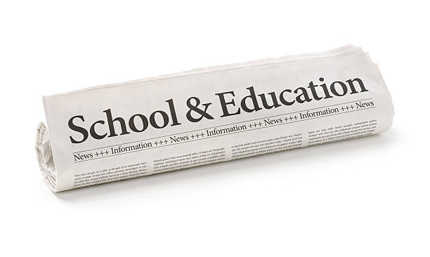 istock Rolled newspaper with the headline School and Education 474950650