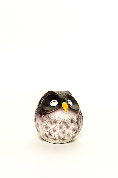 istock One resin owl doll closed its eyes 474953722