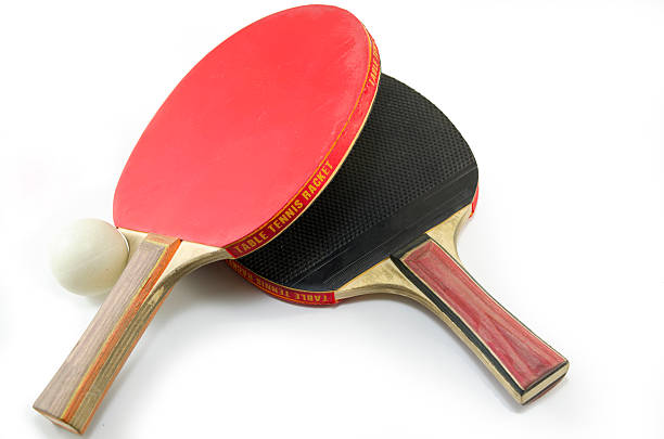 istock Two table tennis rackets and a ball isolated 474954130