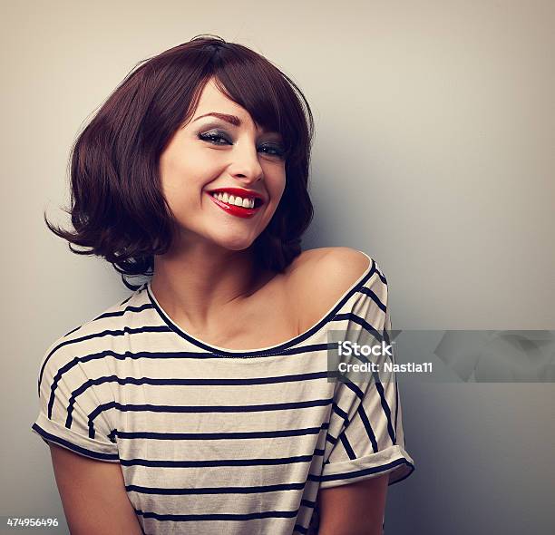 Happy Laughing Young Woman With Short Hair In Fashion Blouse Stock Photo - Download Image Now