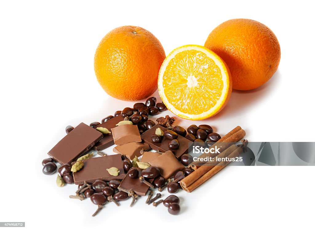 Chocolate, orange, spices isolated on white. Selective focus Chocolate Stock Photo