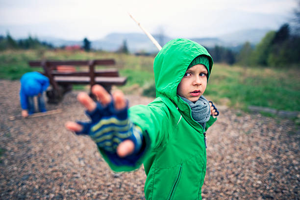 istock Little boys playing jedi knights 474962808