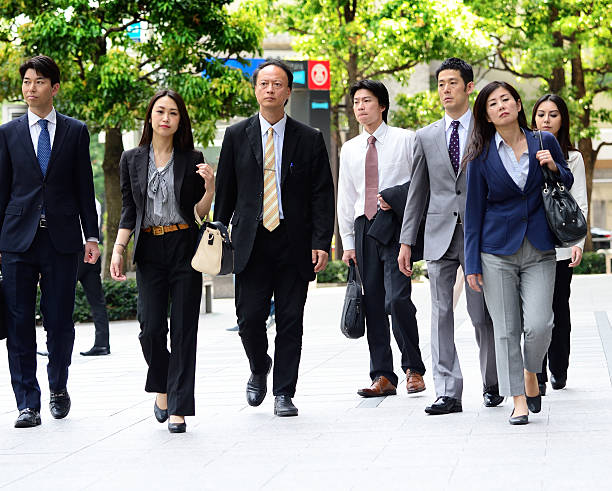 istock Pedestrian crowd walking in central Tokyo 474964600